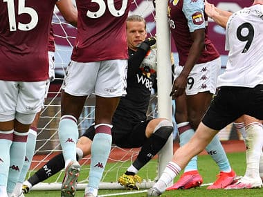 Aston Villa's Oerjan Nyland saves inside the net during their Premier League match against Sheffield United.AP