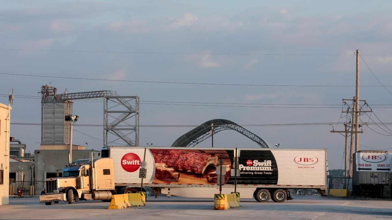 A JBS meat processing facility in Beardstown, Ill., on July 23, 2019. Senators Elizabeth Warren (D-Mass.) and Cory Booker (D-N.J.) have questioned how companies like JBS could warn of pandemic shortages while exporting record amounts of pork to China. [Amy Qin/Whitney Curtis] © 2020 The New York Times