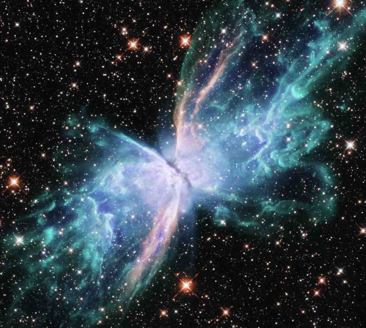 Hubble was recently retrained on NGC 6302, the Butterfly Nebula, so researchers could observe it across a more complete spectrum from near-UV to near-IR. This also opens up prospects to help researchers better understand the mechanics at work in its technicolor 'wings' of gas. Image: NASA