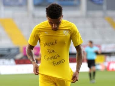 Borussia Dortmund's Jadon Sancho wears a 'Justice for George Floyd' shirt during his team's match against Paderborn. AP
