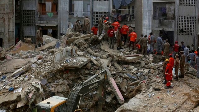 Karachi building collapse: Toll rises to 22 as Pakistani rescuers recover nine more bodies; more deaths feared Karachi building collapse: Toll rises to 22 as Pakistani rescuers recover nine more bodies; more deaths feared