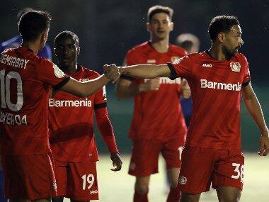 Karim Bellarabi (R) celebrates after scoring the third and final goal for Bayern Leverkusen. AP