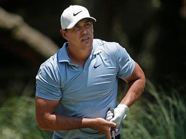 Brooks Koepka watches his shot off the second tee during the final round of the RBC Heritage golf tournament, Sunday, June 21, 2020, in Hilton Head Island, S.C. (AP Photo/Gerry Broome)