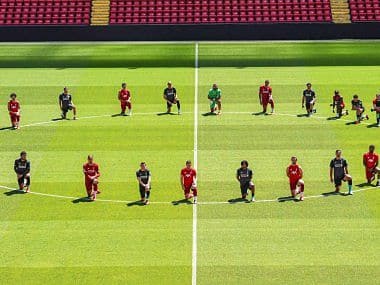 Liverpool's squad was pictured kneeling during a training session. Image Courtesy: Twitter @LFC
