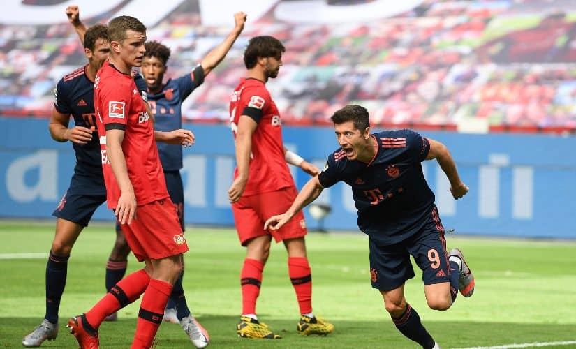 Bundesliga top scorer Robert Lewandowski headed in Thomas Mueller’s 20th assist of the season to seal Bayern’s ninth straight win. AP