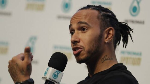 Formula 1 champion Lewis Hamilton condemns Bernie Ecclestone's 'ignorant' racism comments