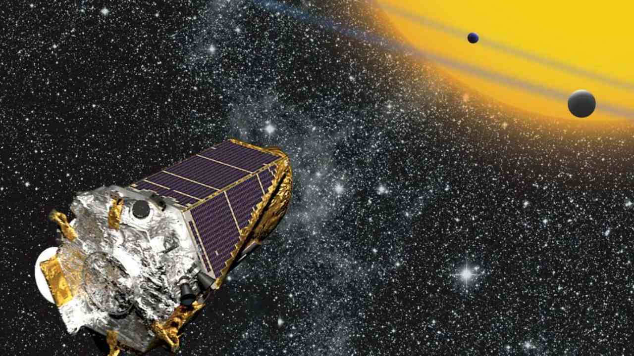 Artist’s conception of Kepler telescope observing planets transiting a distant star Image credit: NASA Ames/W Stenzel