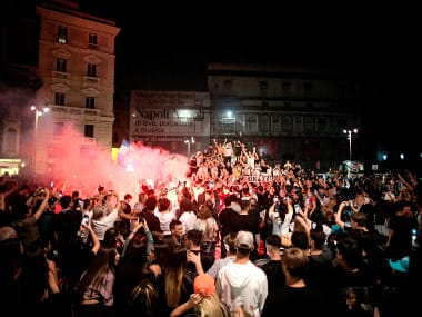 Napoli fans celebrate their team's victory over Juventus in the Coppa Italia final in the streets of Naples, Italy. AP