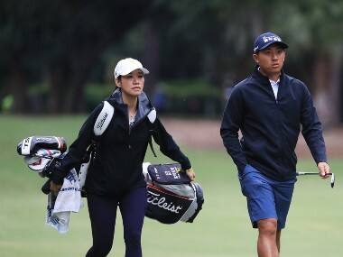CT Pan with his wife and caddie Michelle. 
