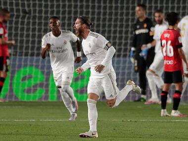 Real Madrid’s Sergio Ramos celebrates after scoring his side’s second goal during the Spanish La Liga soccer match between Real Madrid and Mallorca at Alfredo di Stefano stadium in Madrid, Spain, Wednesday, June 24, 2020. (AP Photo/Bernat Armangue)