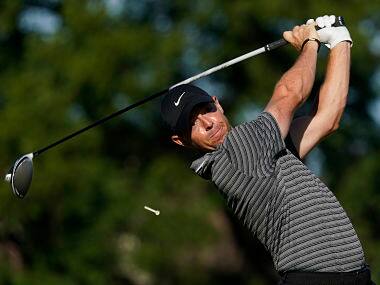 Rory McIlroy tees off on the 11th hole during the second round of the Charles Schwab Challenge golf tournament. AP
