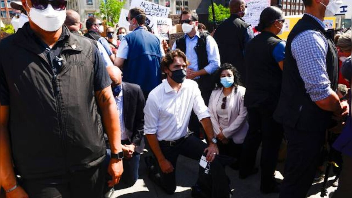 'Stand up to Trump!' Canada protesters shout to Justin Trudeau who kneels at anti-racism rally