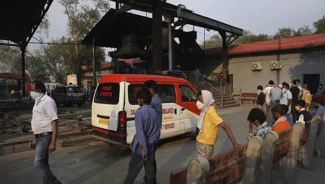 In Mumbai's crematoriums, exhausted workers pull on to earn a living despite psychological stress, fear of COVID-19 In Mumbai's crematoriums, exhausted workers pull on to earn a living despite psychological stress, fear of COVID-19
