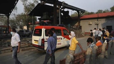 In Mumbai's crematoriums, exhausted workers pull on to earn a living despite psychological stress, fear of COVID-19