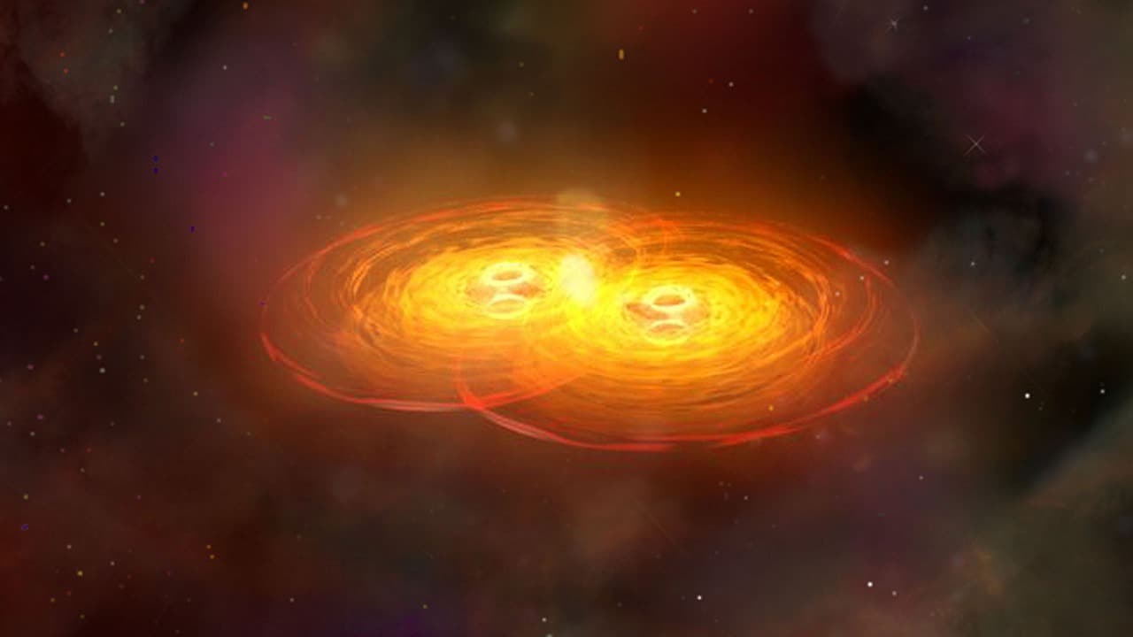  This illustration shows a stage in the merger of two galaxies that forms a single galaxy with two centrally located supermassive black holes surrounded by disks of hot gas. The black holes orbit each other for hundreds of millions of years before they merge to form a single supermassive black hole that sends out intense gravitational waves. Image credit: NASA/CXC/A.Hobart