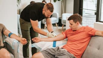 Australia stops COVID-19 vaccine trials as many volunteers generate HIV antibodies
