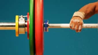 IOC disqualifies three Romanian weightlifters from 2012 London Games for failing anti-doping tests