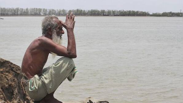Submerged homes, flooded fields, derailed lives: The aftermath of Cyclone Amphan in Bangladesh, in photos