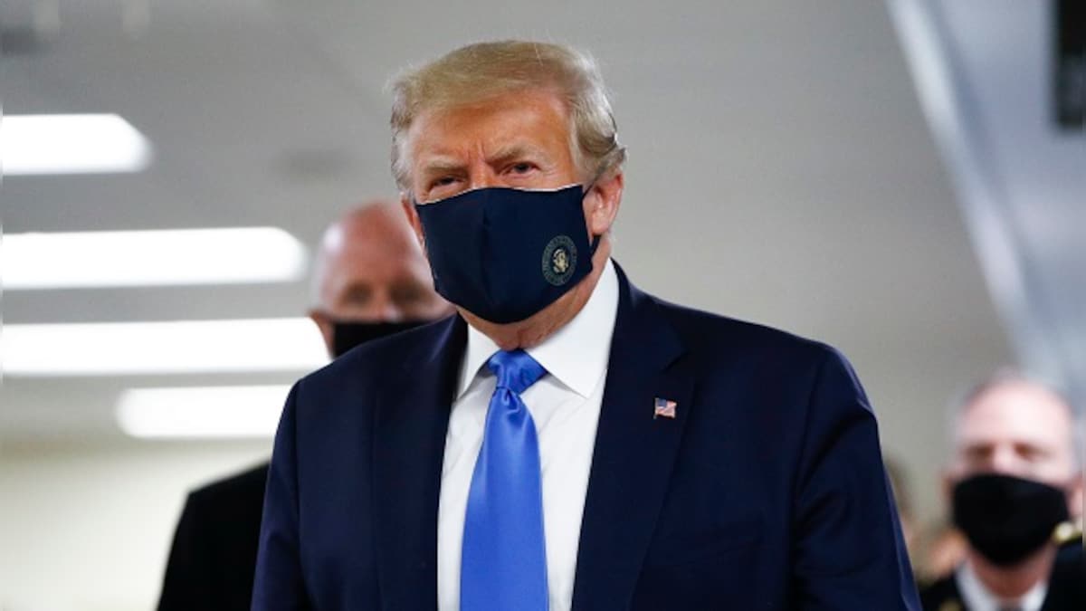 Donald Trump, visiting military hospital, wears mask in public for first time; 'too little, too late', says Biden camp