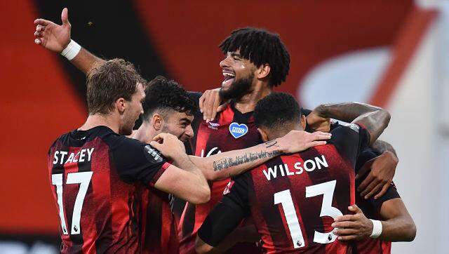 Bournemouth's Dominic Solanke celebrates with teammates after scoring his team's fourth goal against Tottenham. AP