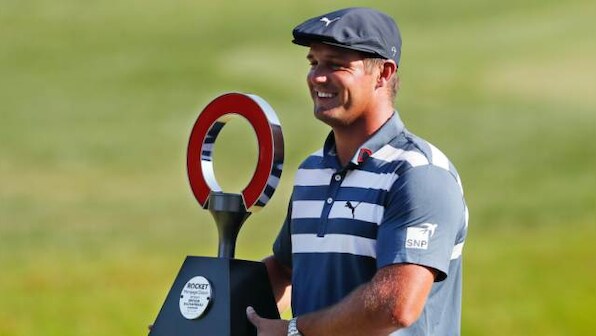 Bryson DeChambeau muscles his way to three-shot victory at Rocket Mortgage Classic in Detroit