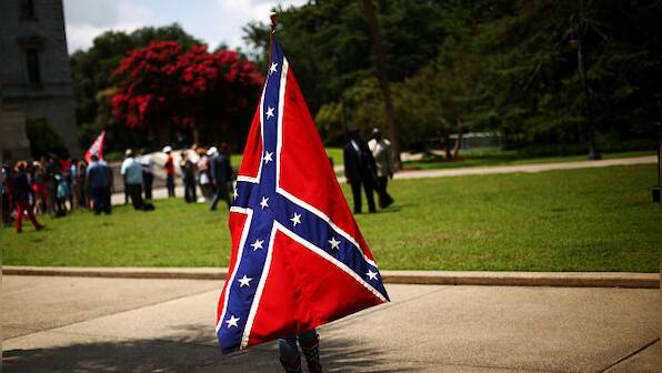 Donald Trump's defence of Confederate flag adds to playbook of stoking White fear, resentment