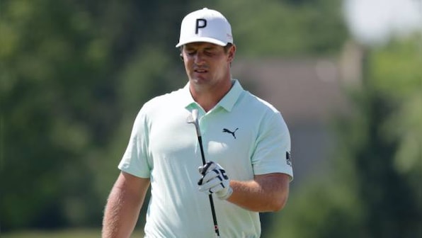 Tiger Woods, Bryson DeChambeau attract attention at Memorial practice round for different reasons