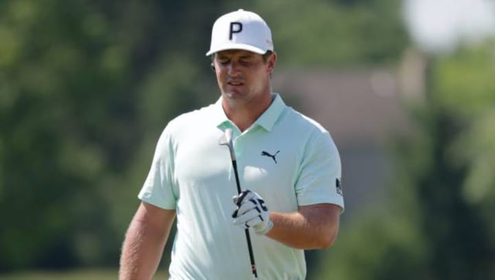 Tiger Woods, Bryson DeChambeau attract attention at Memorial practice round for different reasons