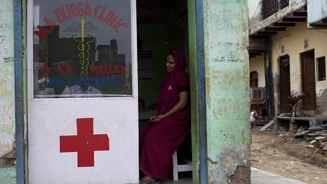 An Indian patient looks on at a small roadside clinic in a slum in New Delhi. Getty Images/Andrew Caballero-Reynolds