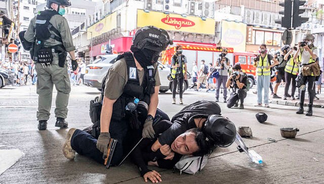 Changed overnight by new National Security Law, Hong Kong navigates