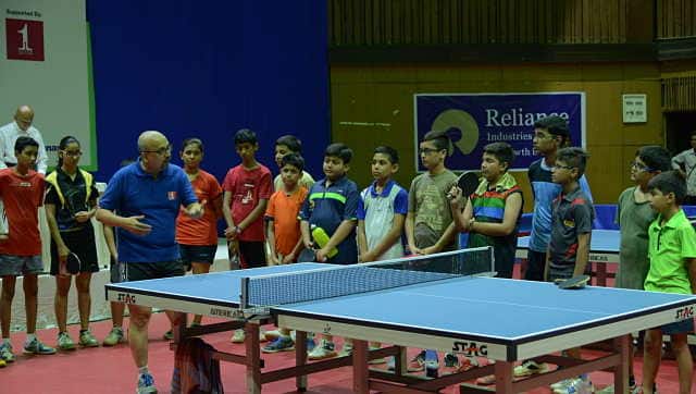 Kamlesh Mehta coaching the kids. Image courtesy Kamlesh Mehta