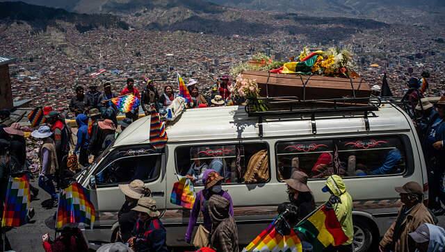 File image of coffins of demonstrators killed in clashes between protesters and government forces being carried during a funeral procession and protest march in La Paz, Bolivia. By Federico Rios © 2020 The New York Times