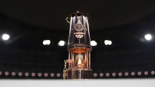 A view of the Olympic flame in a lantern, after the 