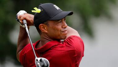 Tiger Woods discharged from hospital, continues recovery at home after car crash