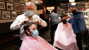 'Beautiful' to have a pint, 'brilliant' to get a haircut: England reopens after lockdown