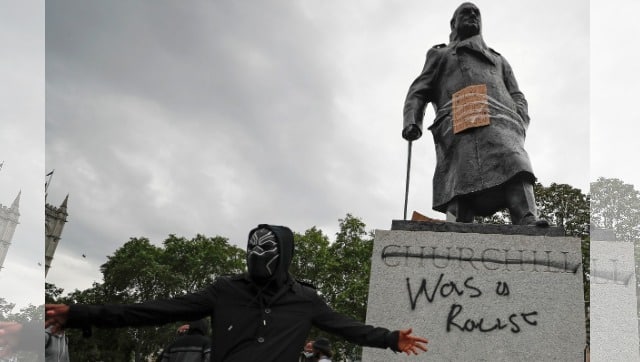 Protesters gather around the Winston Churchill statue in Parliament Square during the Black Lives Matter protest rally in London. AP Photo