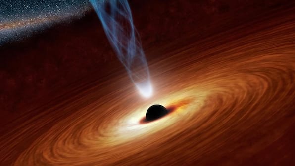Scientists discover a huge black hole, 700 million light-years away, that eats about one sun per day