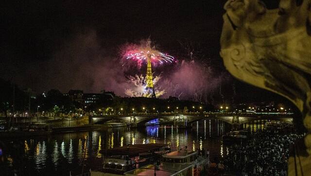 Fireworks illuminate the Eiffel Tower in Paris during Bastille Day celebrations late Tuesday, 14 July, 2020. (AP Photo/Rafael Yaghobzadeh)