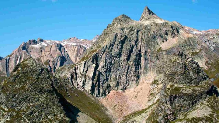 Glacial ice on Italy's Alps turns a shade of pink due to algae, leads to concerns of melting