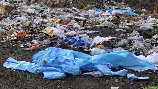 PPEs and other biomedical waste strewn indiscriminately at Delhi’s Lodi Road crematorium. 