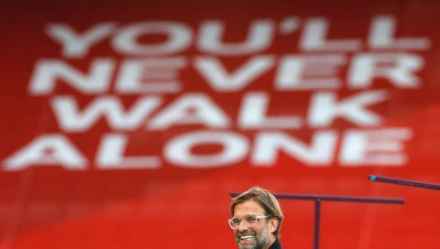 Liverpool's manager Jurgen Klopp smiles before the English Premier League soccer match between Liverpool and Crystal Palace at Anfield Stadium in Liverpool, England, Wednesday, June 24, 2020. (Phil Noble/Pool via AP)