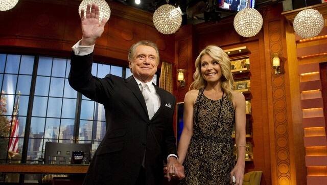 In this Friday, Nov. 18, 2011, file photo, Regis Philbin and Kelly Ripa appear on Regis’ farewell episode of 