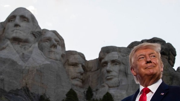 Donald Trump delivers divisive culture war message at Mount Rushmore in bid to win second term, barely mentions pandemic