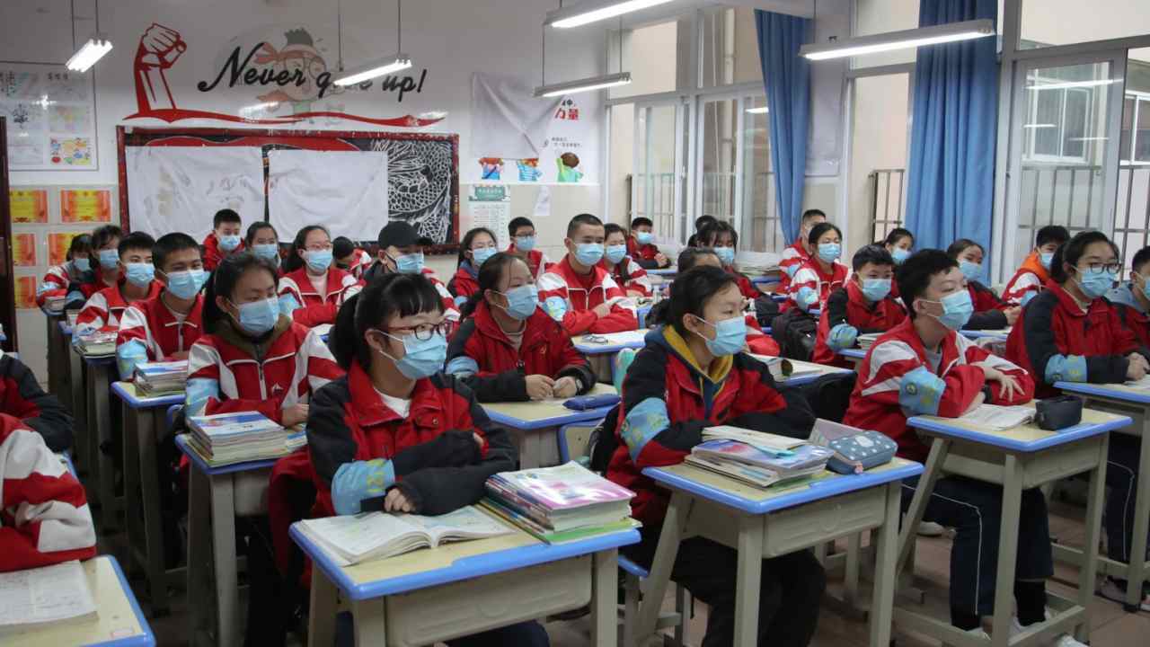 Beijing’s Yonsei University students attend classes with masks on. Image Credit: Loyola Marymount University Press