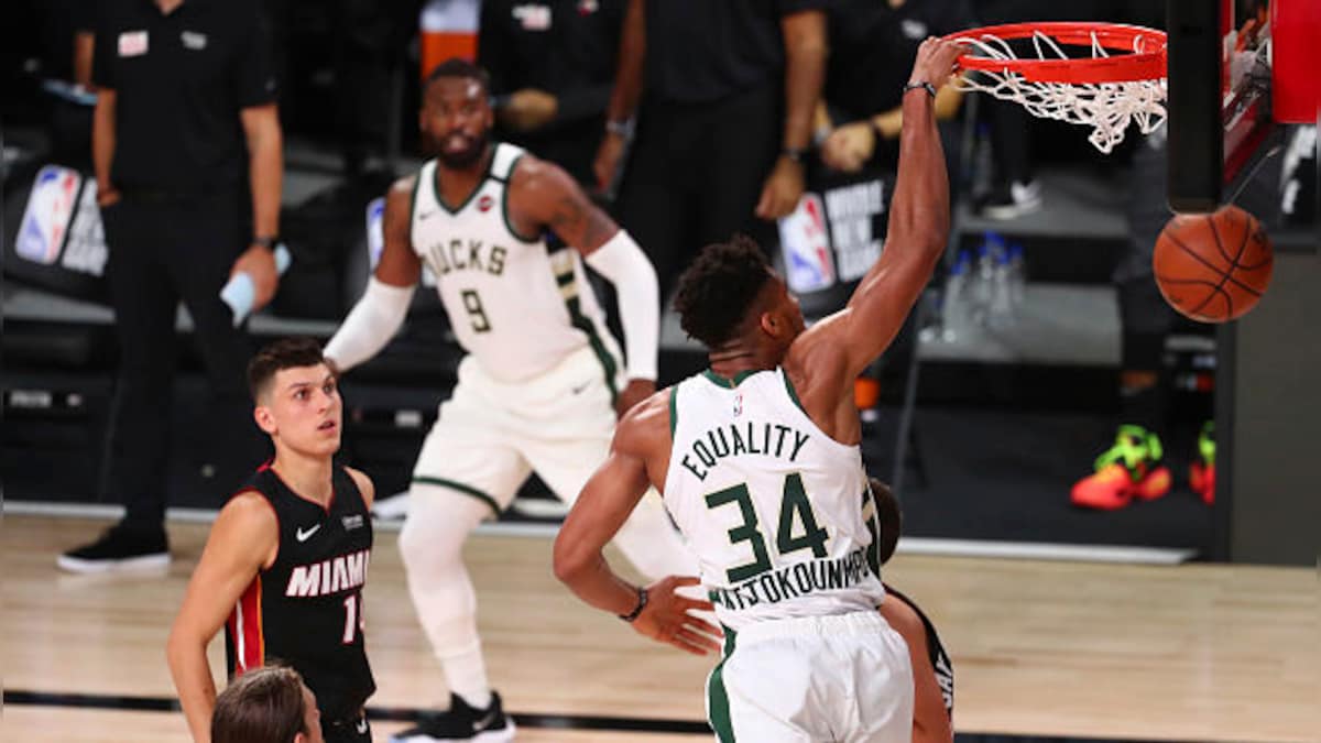 NBA: Giannis Antetokounmpo helps Milwaukee Bucks beat Miami Heat, clinch top seed in Eastern Conference