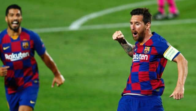 Barcelona’s Lionel Messi, right, celebrates after scoring his side’s second goal during the Champions League round of 16, second leg soccer match between Barcelona and Napoli at the Camp Nou Stadium in Barcelona, Spain, Saturday, Aug. 8, 2020. (AP Photo/Joan Monfort)