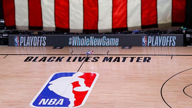 An empty court and bench are seen as NBA Playoff games were not played on Wednesday. AP Photo