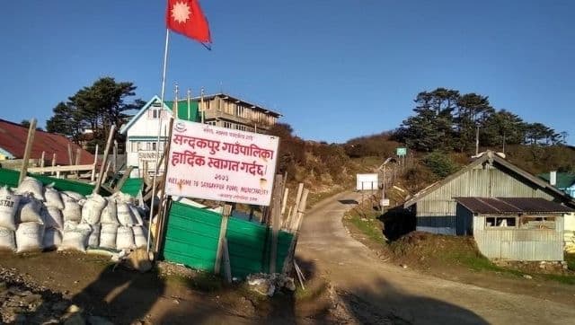 The road separating India and Nepal at Sandakphu in Singalila National Park. Image via The Third Pole/ Sangay Tamang