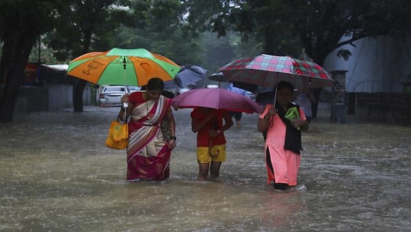 Mumbai rains: Buses, trains come to a halt as incessant showers lash city; IMD issues red alert till Wednesday