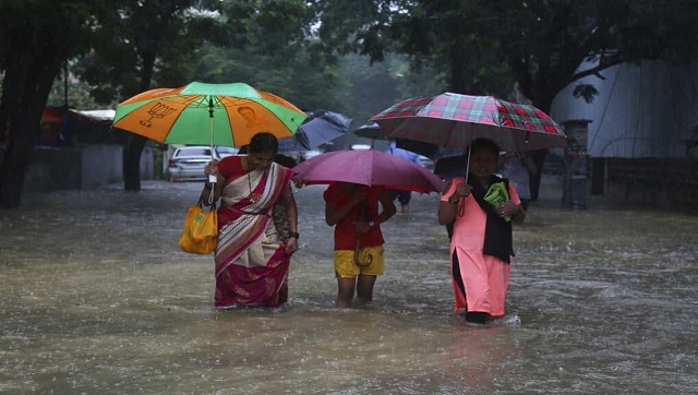 Mumbai rains: Buses, trains come to a halt as incessant showers lash city; IMD issues red alert till Wednesday Mumbai rains: Buses, trains come to a halt as incessant showers lash city; IMD issues red alert till Wednesday